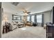 Spacious living room with carpet, lots of seating, ceiling fan, and natural light at 5050 Kinross Ln, Indian Land, SC 29707