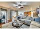 Spacious living room with a large sectional sofa and seamless access to the kitchen at 5050 Kinross Ln, Indian Land, SC 29707