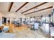Spacious meeting room featuring hardwood floors, beamed ceilings, and modern lighting at 5050 Kinross Ln, Indian Land, SC 29707