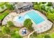 Aerial view of the swimming pool, splash pad, kiddie pool, and lounge chairs at 5050 Kinross Ln, Indian Land, SC 29707