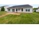 The home's backyard has a concrete patio and a spacious grassy area at 508 Danfield Dr, Clover, SC 29710