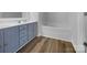 Bathroom features double vanity, wood-look floors, and a soaking tub at 508 Danfield Dr, Clover, SC 29710