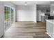 Open dining area features hard wood flooring and sliding glass doors to the backyard at 508 Danfield Dr, Clover, SC 29710