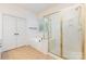 Bathroom featuring a shower with gold trim and a soaking tub at 6904 Mordred Ln, Charlotte, NC 28277