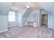 Spacious bedroom with a built-in desk and shelving, offering a functional and inviting area at 6927 Ellington Farm Ln, Mint Hill, NC 28227