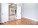 Office featuring hardwood floors, double doors, and view of the dining room at 6927 Ellington Farm Ln, Mint Hill, NC 28227