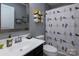 Modern bathroom with a black vanity and stylish, bird-themed shower curtain at 7397 Mill Ruins Sw Ave, Concord, NC 28025