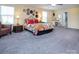 Bright main bedroom with decorative wall art and an en-suite bathroom at 7397 Mill Ruins Sw Ave, Concord, NC 28025