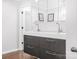 Modern bathroom with double vanity, recessed lighting, and mirrored cabinets for ample storage at 78 N Scalybark Trl, Concord, NC 28027