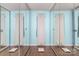 This closet features built-in full length mirrors and hardwood flooring at 78 N Scalybark Trl, Concord, NC 28027