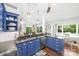 Open-concept kitchen with granite countertops, custom cabinetry, and stainless-steel appliances at 78 N Scalybark Trl, Concord, NC 28027
