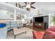 Open-concept living room featuring stylish decor and modern entertainment center at 78 N Scalybark Trl, Concord, NC 28027