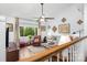 Bright living room with hardwood floors and a cozy seating area near the windows at 78 N Scalybark Trl, Concord, NC 28027
