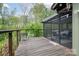 Inviting wooden porch overlooking a lush, green landscape at 78 N Scalybark Trl, Concord, NC 28027