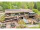Backyard retreat featuring solar panels, a large deck, hot tub, and outdoor seating at 78 N Scalybark Trl, Concord, NC 28027