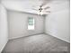 Bedroom with carpet, a ceiling fan and a window for natural light at 805 Gunnar Dr, Gastonia, NC 28054