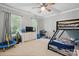 Bedroom with a bunk bed and a television on top of the dresser at 902 Hoke Trl, Cramerton, NC 28032