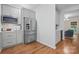 Kitchen with stainless steel refrigerator, microwave, and adjacent butler's pantry at 902 Hoke Trl, Cramerton, NC 28032