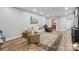 Cozy living room with neutral paint, decorative rug, and comfortable furniture at 902 Hoke Trl, Cramerton, NC 28032