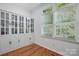 Office space with white built in cabinets and natural light, a perfect area to work from home at 902 Hoke Trl, Cramerton, NC 28032