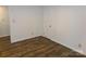 Neat bedroom features hardwood floors, a closet, and natural lighting, offering a serene space at 906 N 11Th St, Albemarle, NC 28001