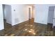 Bright living room featuring beautiful hardwood floors, fresh white paint, and ample natural light at 906 N 11Th St, Albemarle, NC 28001