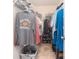 Walk-in closet with ample hanging space, wire shelving, and storage for clothes and shoes at 9106 Dogwood Ridge Dr, Charlotte, NC 28227