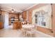 Eat-in kitchen nook with breakfast table, natural light, and tile flooring at 9106 Dogwood Ridge Dr, Charlotte, NC 28227