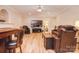 Spacious living room with a ceiling fan, recessed lights, laminate flooring, and comfortable seating at 9106 Dogwood Ridge Dr, Charlotte, NC 28227