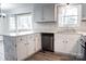 Kitchen featuring white cabinets, stainless steel appliances, updated countertops, and a breakfast bar at 948 Kingswood Dr, Rock Hill, SC 29732