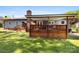 Home exterior features a fenced backyard and spacious covered deck at 1012 Woodlark Ct, Gastonia, NC 28056