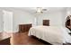 Bedroom with hardwood floors, ample storage, and neutral color palette at 1012 Woodlark Ct, Gastonia, NC 28056