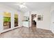 Bright kitchen with white cabinets and access to a wood deck at 1012 Woodlark Ct, Gastonia, NC 28056