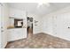 Bright kitchen with white cabinetry and views into living spaces at 1012 Woodlark Ct, Gastonia, NC 28056