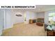 Large bonus room with neutral carpet and views to additional rooms at 103 Way Cross Ln, Troutman, NC 28166