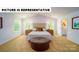 Spacious carpeted main bedroom with vaulted ceiling and light filled windows provides a relaxing retreat at 103 Way Cross Ln, Troutman, NC 28166