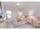 Cozy bedroom featuring a comfortable bed, dresser, and rocking chair at 11616 Solstice Way, Huntersville, NC 28078