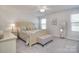 Bright bedroom with a well-lit and spacious layout, perfect for relaxation at 11616 Solstice Way, Huntersville, NC 28078
