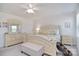 Airy bedroom with a king-size bed, stylish dresser, and a calming neutral palette at 11616 Solstice Way, Huntersville, NC 28078