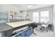 Bright craft room with ample storage and a large work surface, perfect for hobbies at 11616 Solstice Way, Huntersville, NC 28078