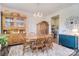Charming dining room featuring wooden furniture, chandelier lighting, and unique decor at 11616 Solstice Way, Huntersville, NC 28078