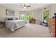 Inviting bedroom with ample natural light, a neutral color scheme, and comfortable furnishings at 12122 Camden Trail Ct, Charlotte, NC 28277