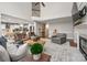 Cozy living room features hardwood floors, fireplace and an open floorplan at 12122 Camden Trail Ct, Charlotte, NC 28277