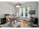 Home office with natural light, desk and workout machine at 12122 Camden Trail Ct, Charlotte, NC 28277