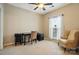 Cozy bedroom with a ceiling fan, a large window, a desk and comfortable chair at 13505 Michael Lynn Rd, Charlotte, NC 28278