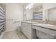 Bright bathroom with double sinks, large mirror and great countertop space at 1488 River Bend Blvd, Fort Mill, SC 29707