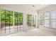 Sunlit room with sliding glass doors to deck and multiple windows, great natural light at 1488 River Bend Blvd, Fort Mill, SC 29707