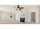 Inviting living room featuring a fireplace and seamless flow to the kitchen, perfect for entertaining at 1488 River Bend Blvd, Fort Mill, SC 29707
