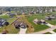 Aerial view of a neighborhood with single-Gathering homes, green lawns, and surrounding wooded areas at 164 Castle Pines Ln, Statesville, NC 28625