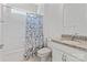 This bathroom features a shower and bathtub combo and a vanity with granite countertops at 184 Tetcott St, Mooresville, NC 28115